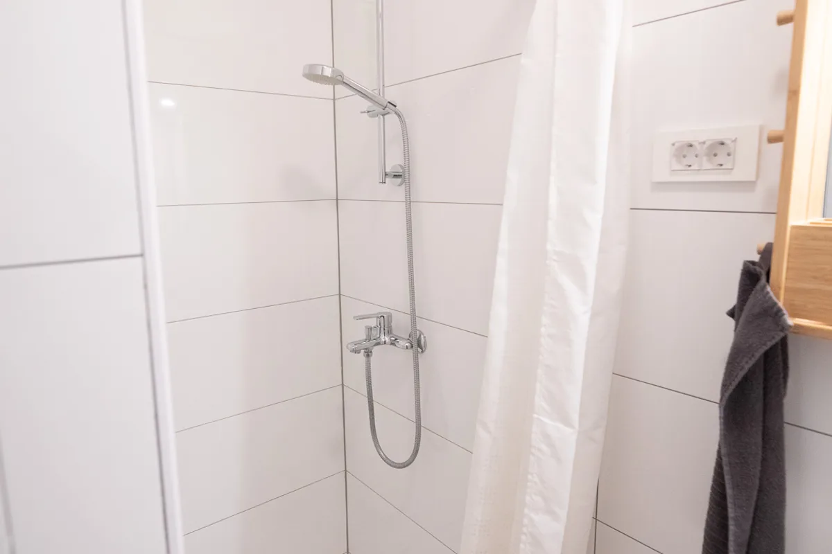 Shower in the private bathroom of Woody 3 studio apartment, Zagreb